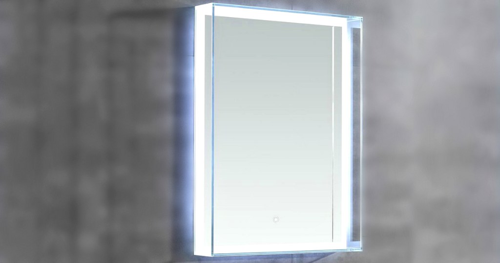 LED lighted bathroom mirror on wall