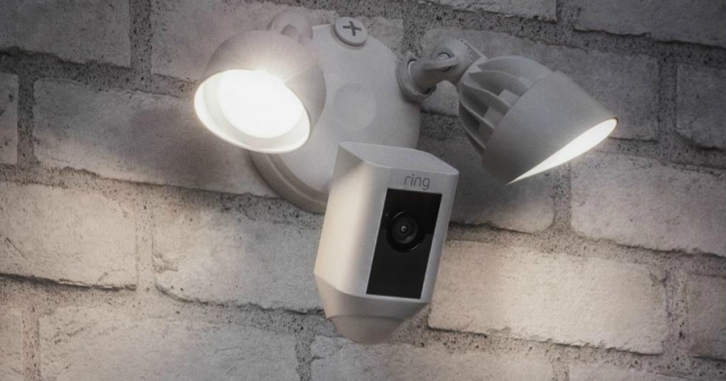 WiFi Motion activated surveillance camera on brick wall