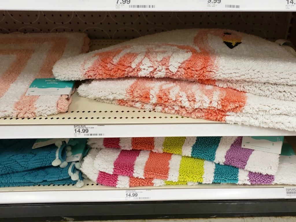 Pillowfort rugs on the shelf at Target