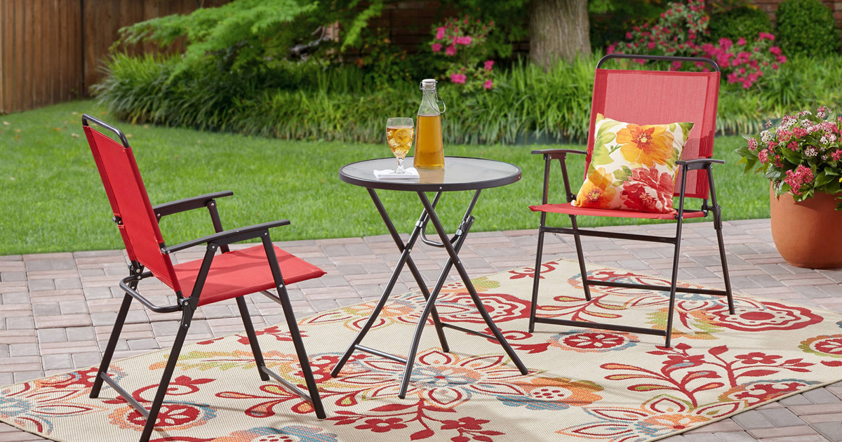 red mainstays bistro set outside on patio