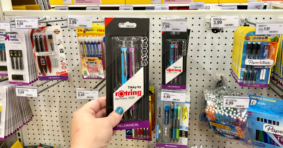 woman holding pack of rotring pens at target