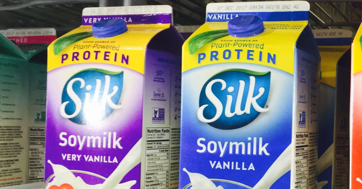 two silk soymilk cartons in a store case