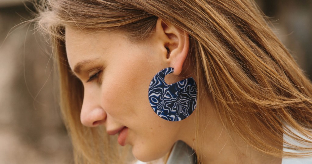 Woman wearing Starfish Project Earrings