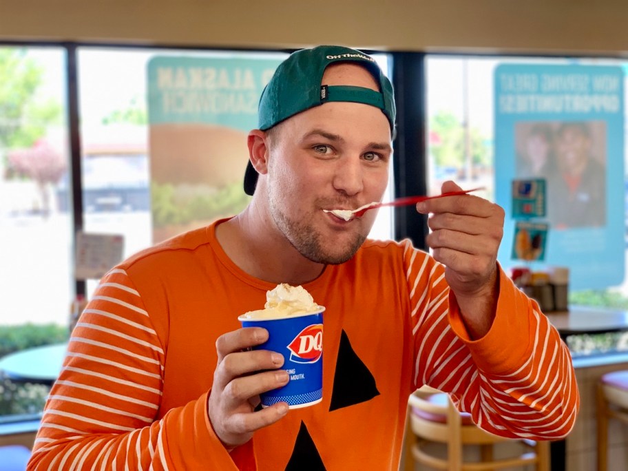 man eating a Dairy Queen blizzard