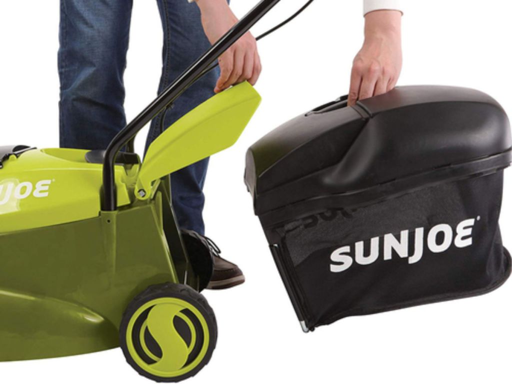 SunJoe Lawn Mower bag with man taking it off