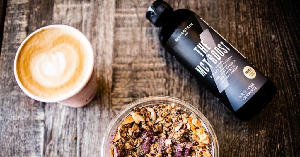 THE MCT Boost from My Protein in 16-ounce bottle with coffee mugTHE MCT Boost from My Protein in 16-ounce bottle with coffee mug and granola bowl