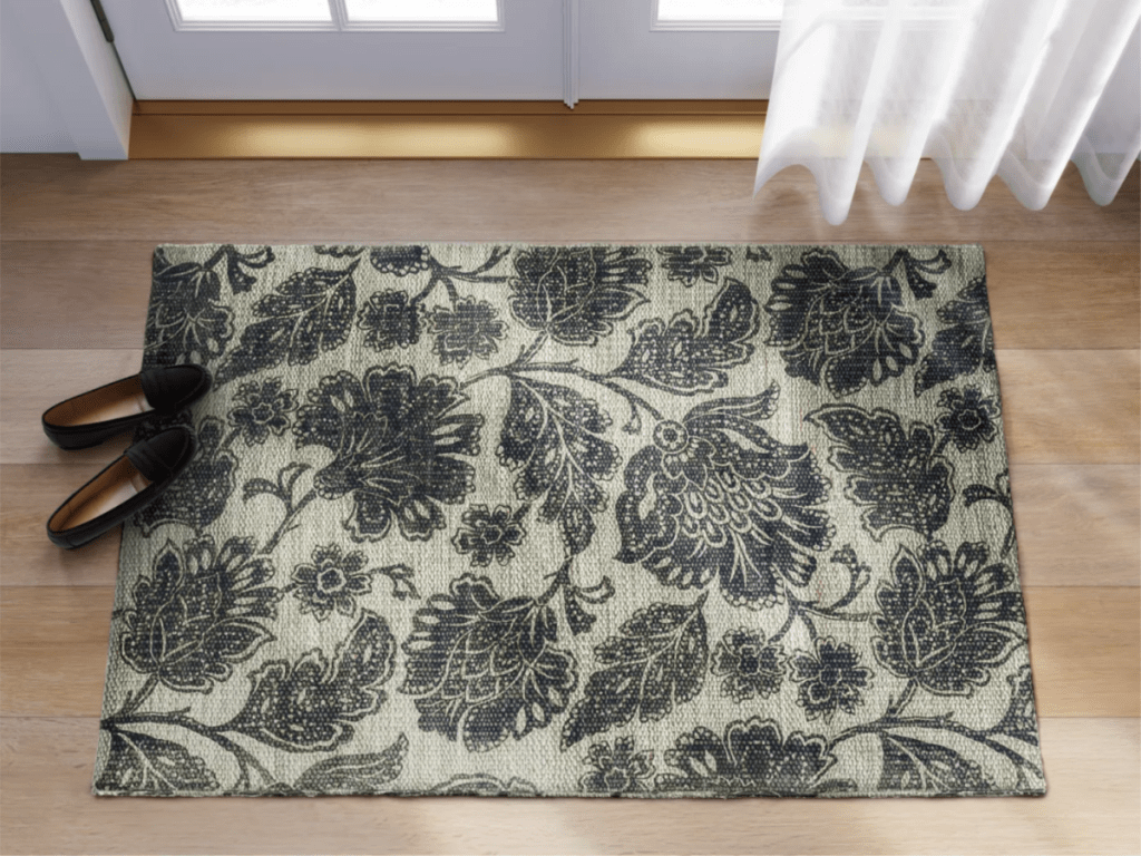 Threshold Large Floral Woven Rug by entryway with shoes
