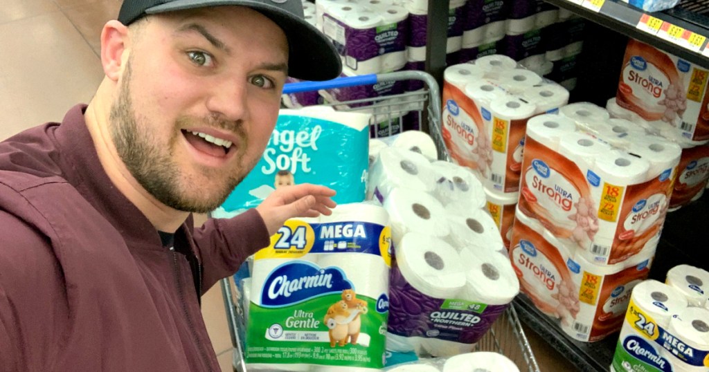 man confused comparing toilet paper price points