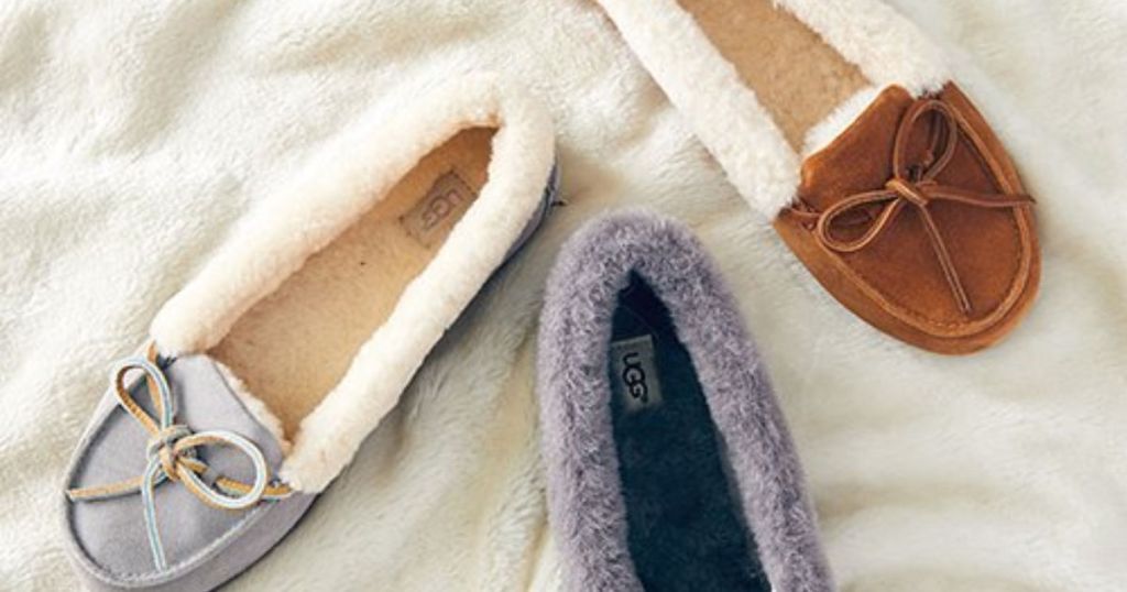 Ugg Solano Slippers in grey, blue, and brown on plush blanket