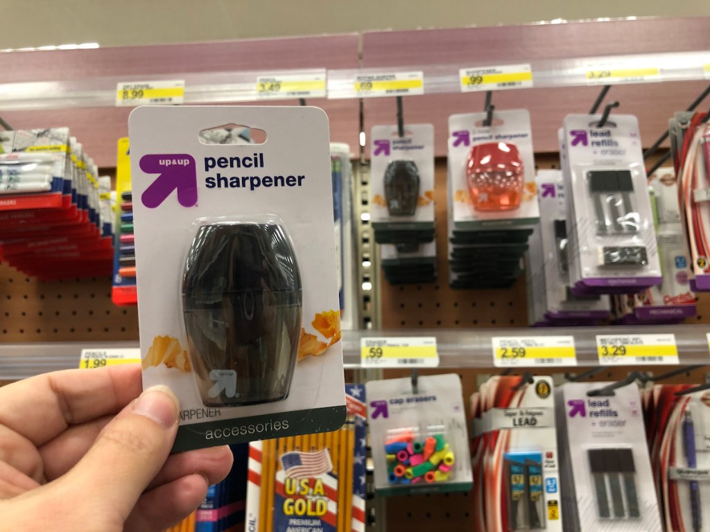 hand holding pencil sharpener at Target