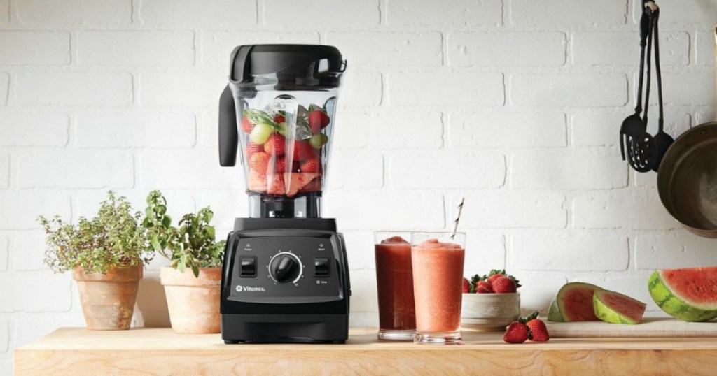 Vitamix blender on counter with smoothies 