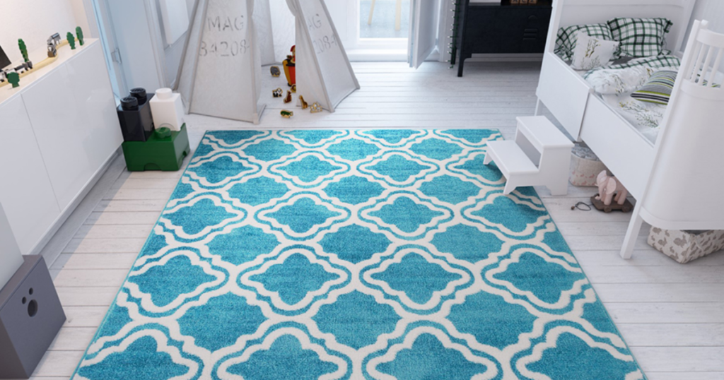 Well Woven Blue Calipso Star Bright Rug in nursery