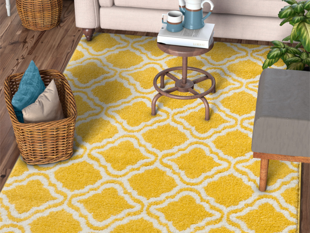 Well Woven Yellow Calipso Star Bright Rug in living room