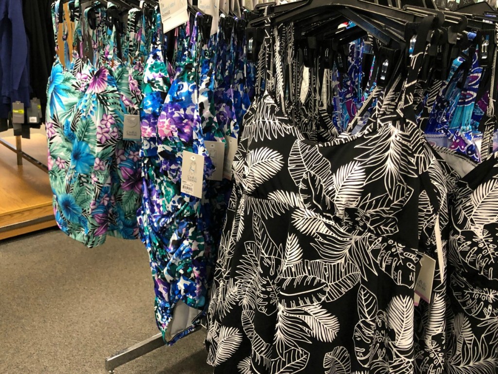 Women's Plus swimsuits hanging on Kohl's Racks