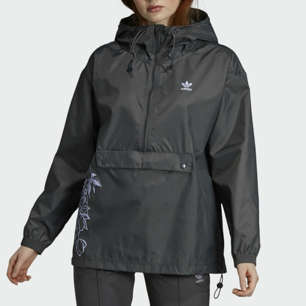 Black windbreaker jacked with floral decal on side
