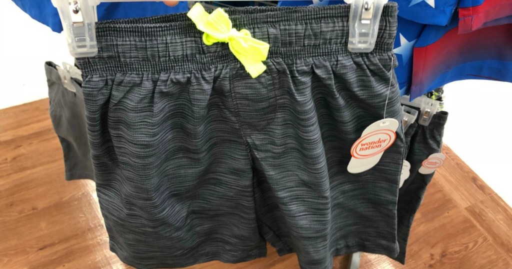 boy's pair of swim trunks on hanger