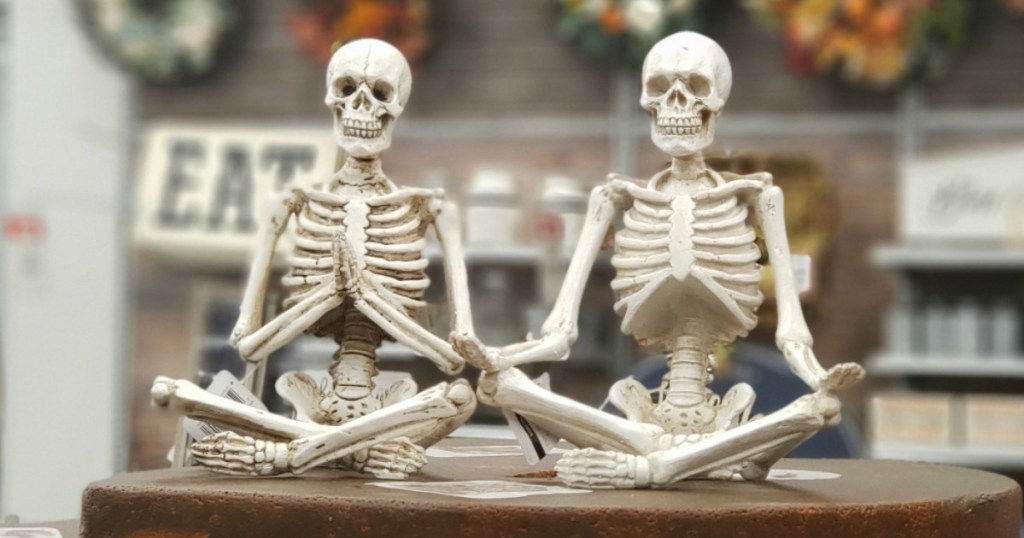 tabletop skeletons in yoga poses in Michaels store