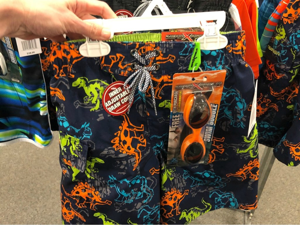 fun boy's dinosaur swim trunks with matching goggles