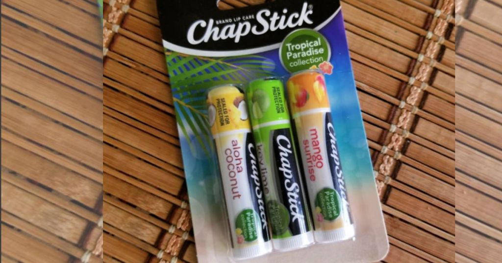 chapstick tropical paradise with wooden background