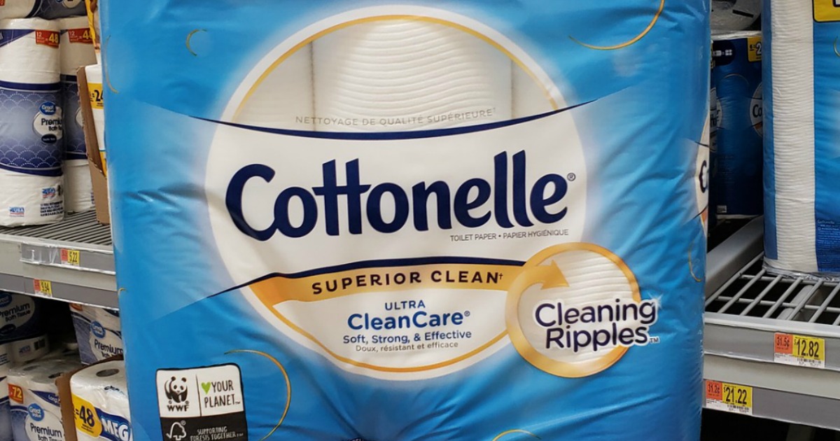 package of Cotttonelle toilet paper held in front of store display