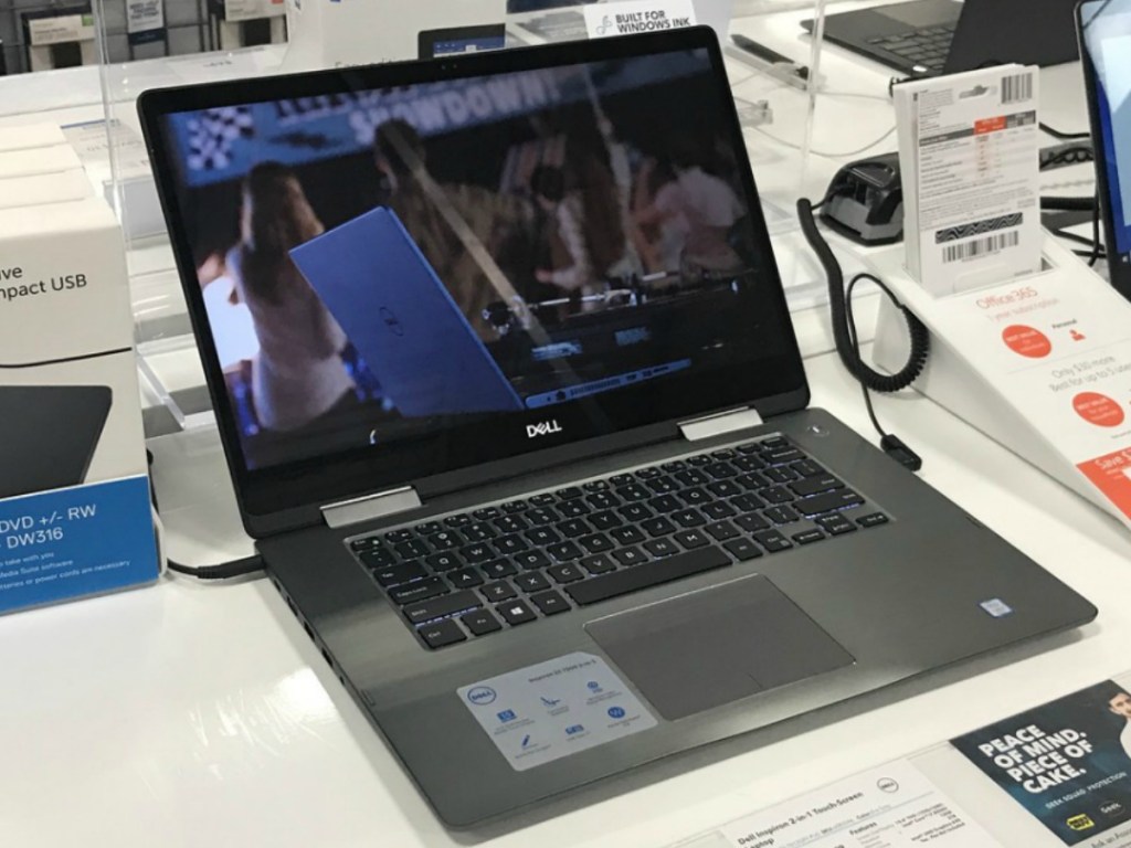 laptop open and sitting on store display