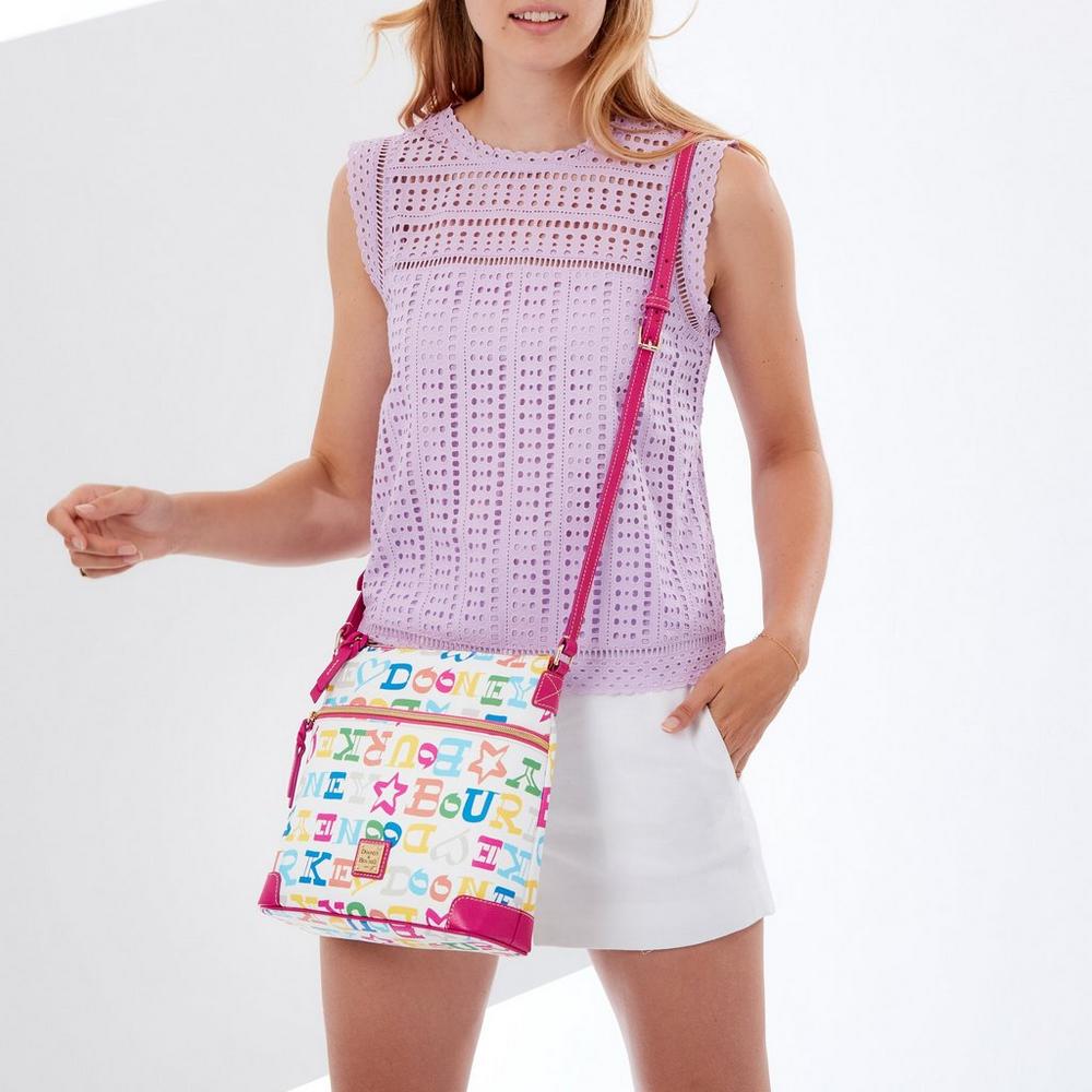 Dooney Doodle Crossbody Tote worn by young woman
