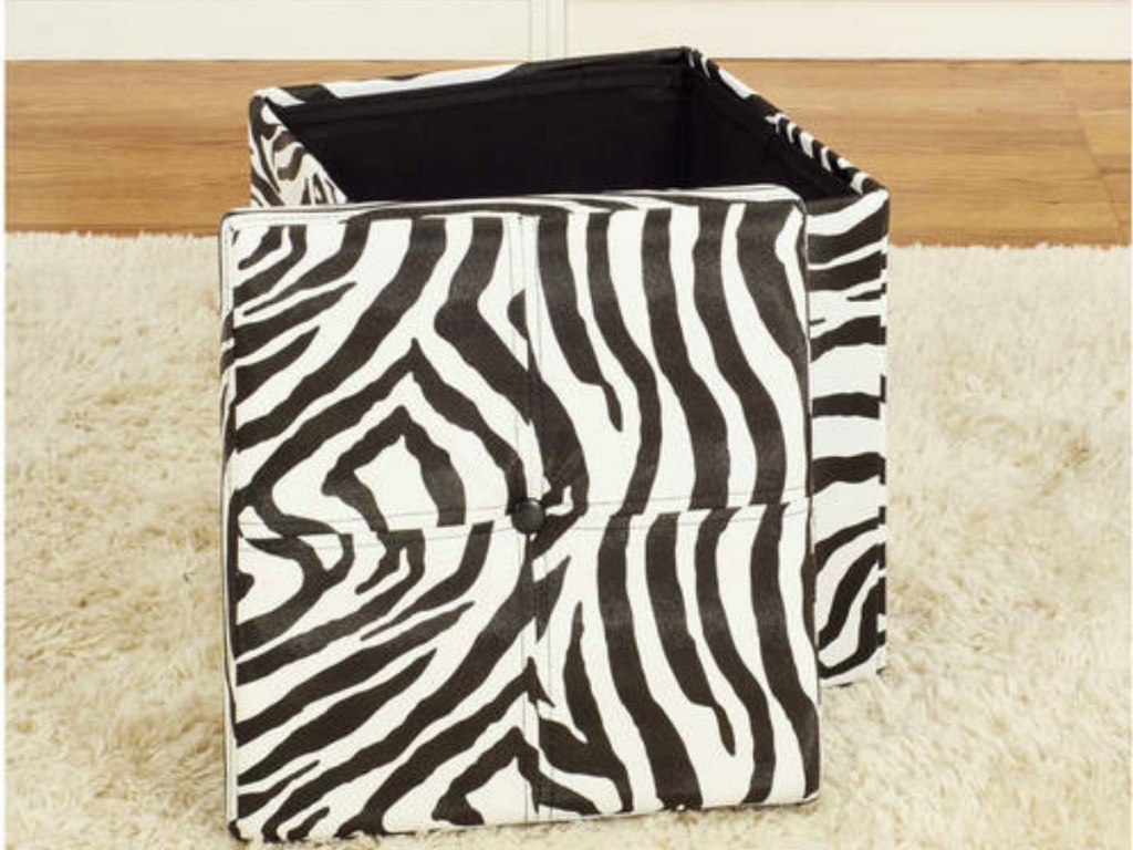 zebra foldable ottoman on carpet 