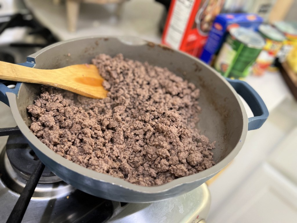 ground beef cooked in a skillet every pan