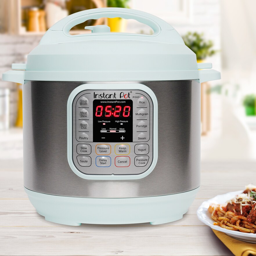 teal instant pot on kitchen counter