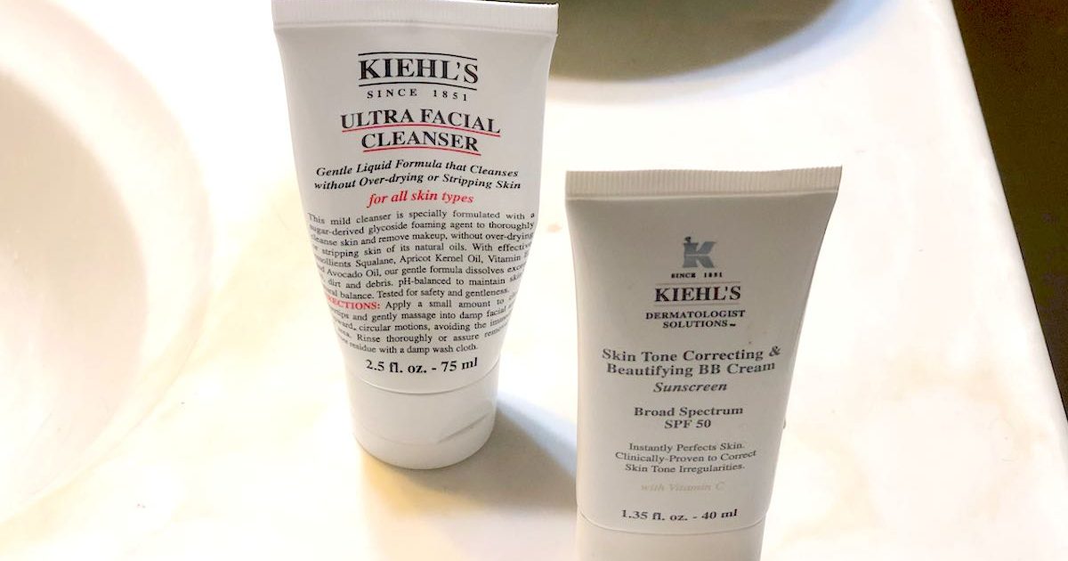 kiehl's facial cleanser and tinted moisturizer sitting on countertop