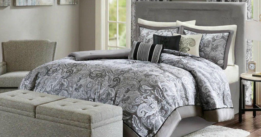 Gray paisley print comforter set on bed