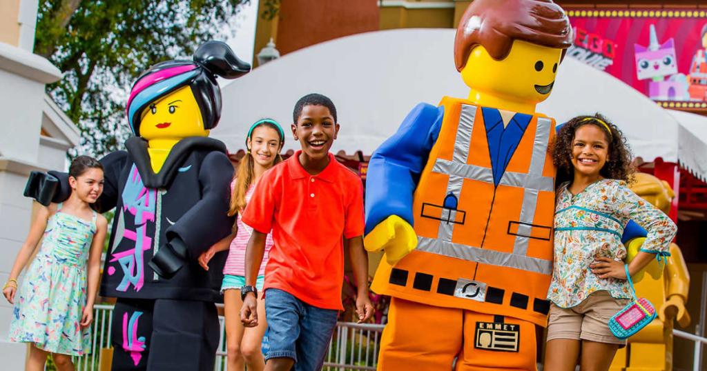 legoland kids walking with giant Lego characters