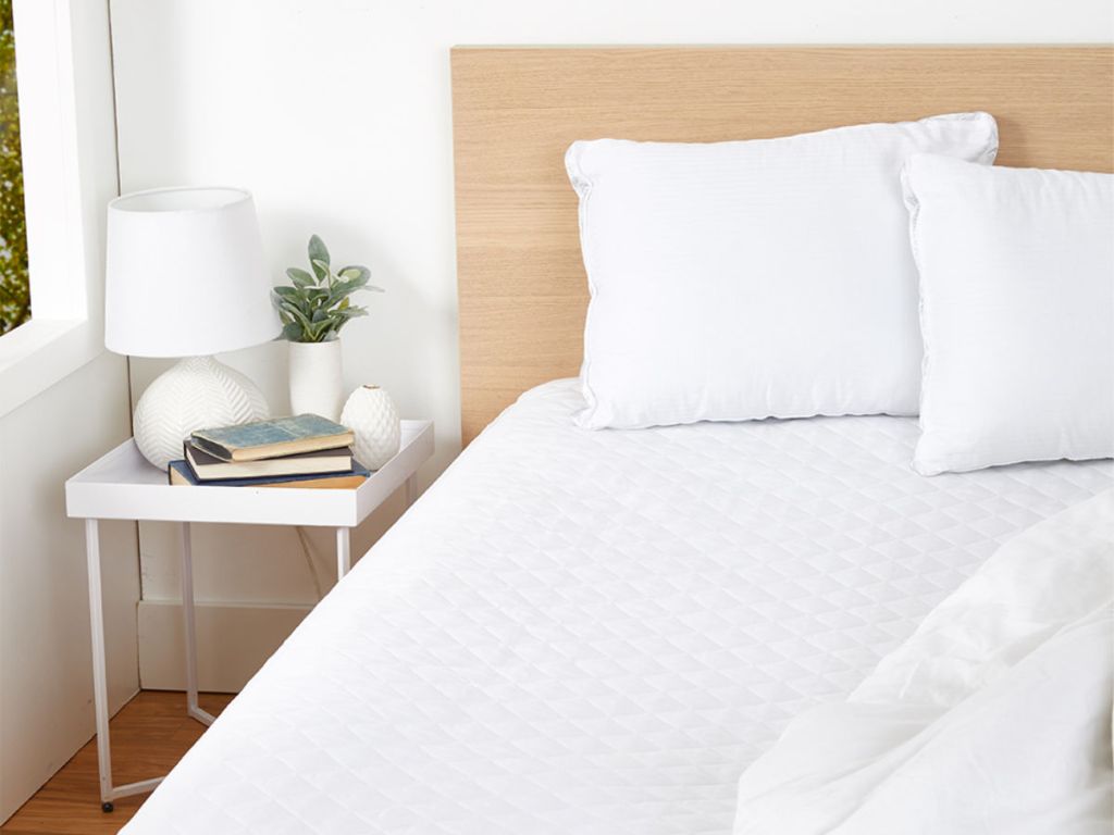 mattress pad on bed