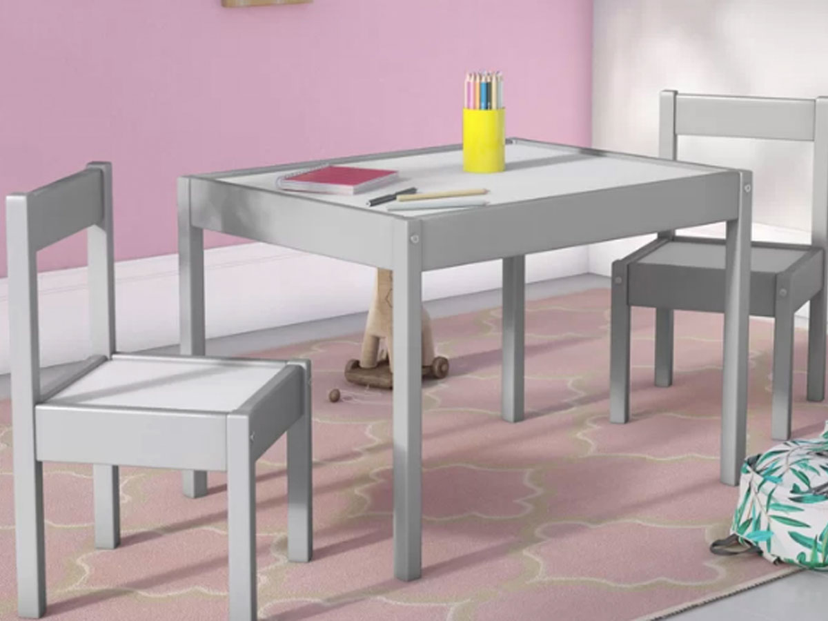 table and chairs in pink room