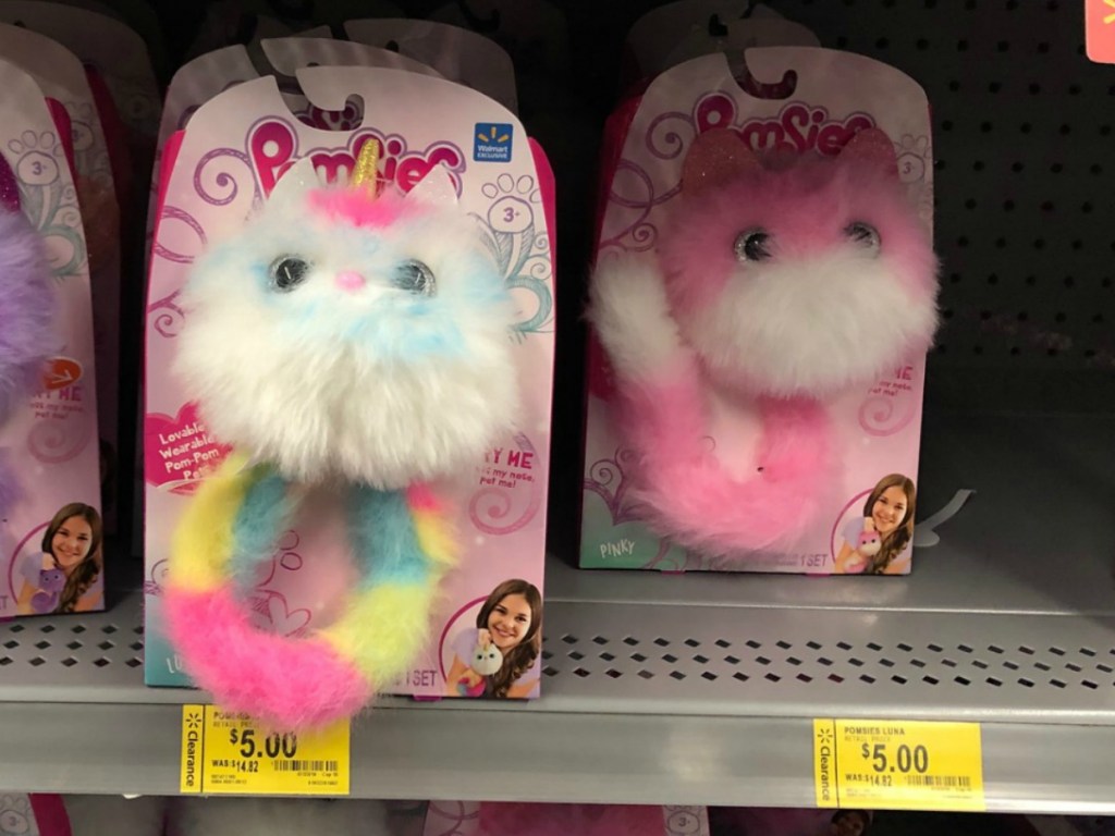 pet plush pink toys on store shelf