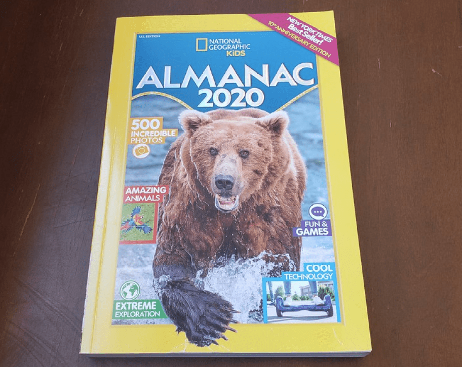 2020 edition of the National Geographic Kids Almanac on wood desk