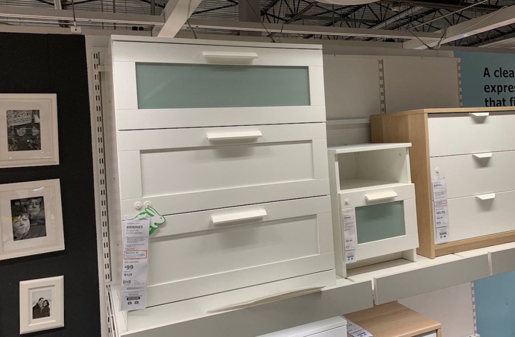 white three drawer dresser on shelf at IKEA 