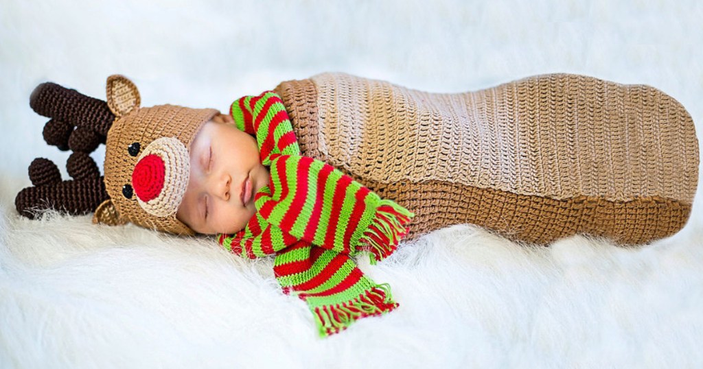 baby wearing crochet reindeer costume