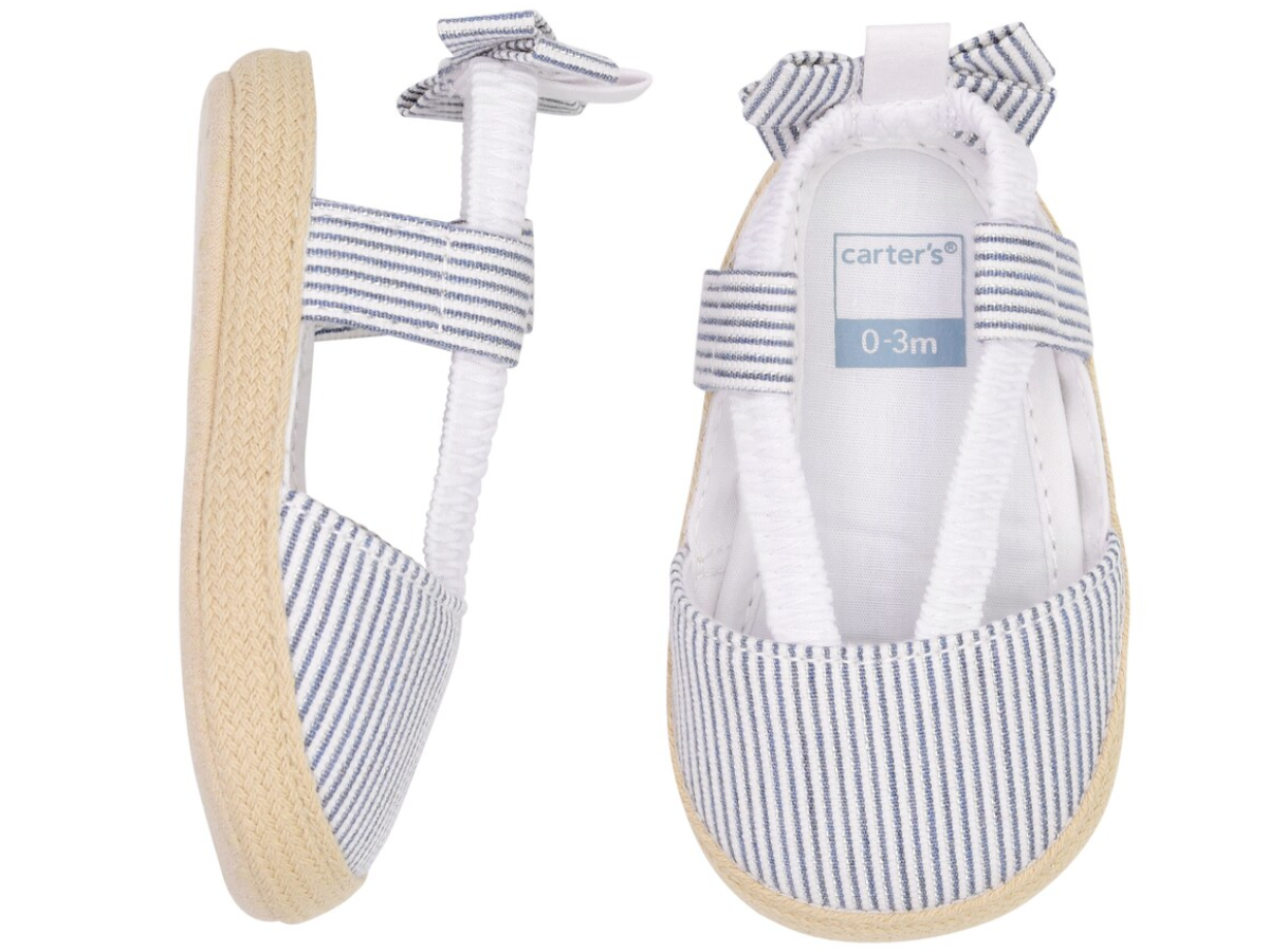 white and blue striped infant shoes