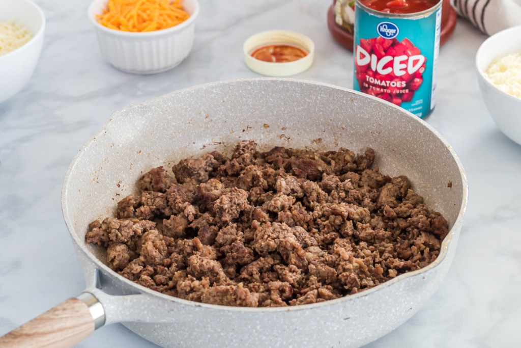 cooked ground beef and sausage