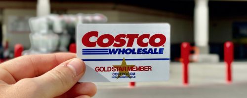 Hand holding Costco Gold Membership card