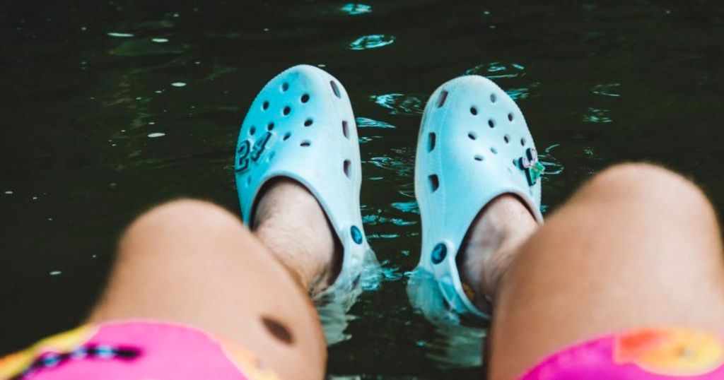 Blue Crocs for Men in lake