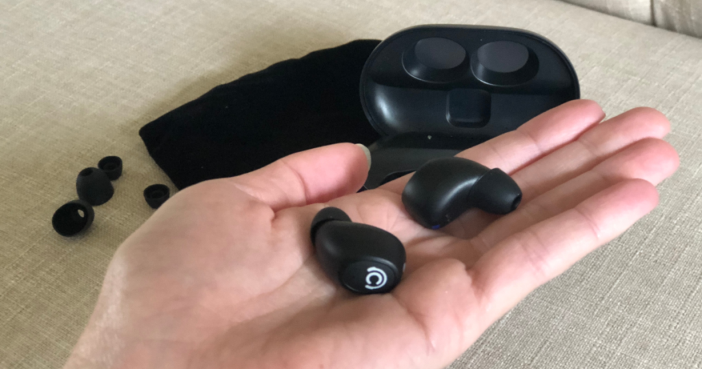 CHISANA Wireless Bluetooth Earbuds in hand