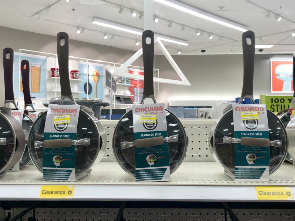 store display with pans on shelves