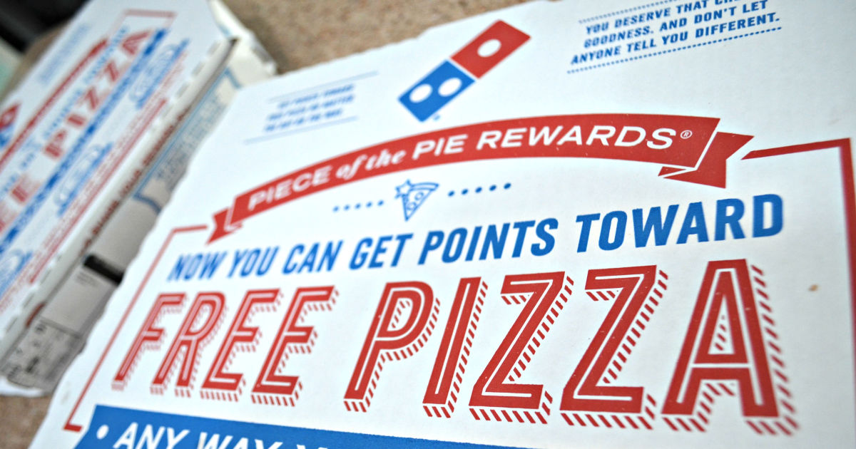 Dominos pizza box featuring piece of the pie rewards