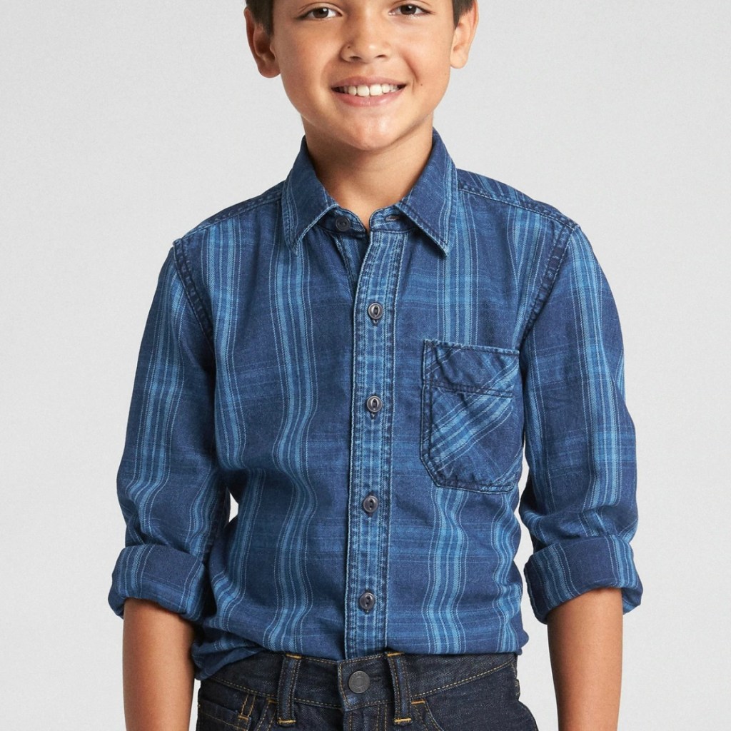 Kid wearing long sleeve plaid shirt