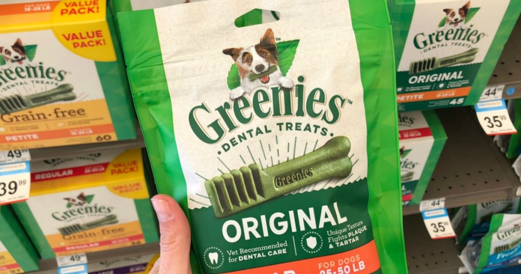 Greenies Dental Treats in bag in-hand at pet store
