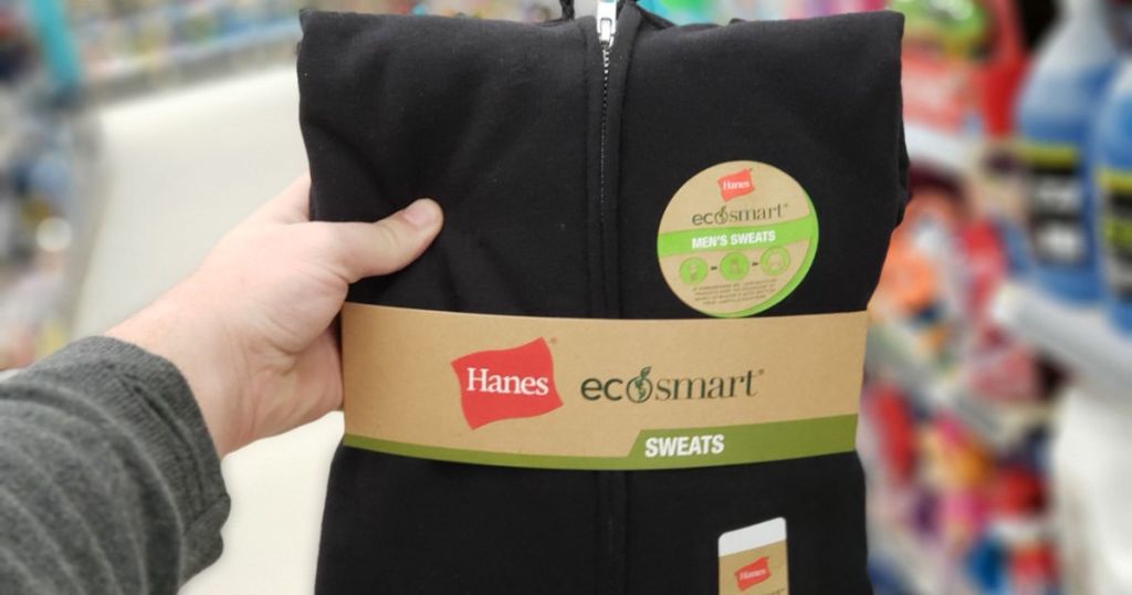 Woman's hand holding up Hanes Hoodie