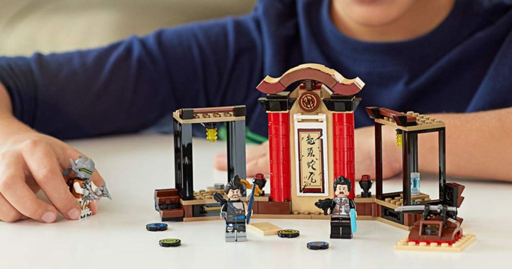 boy playing with LEGO Overwatch Hanzo & Genji Building Kit