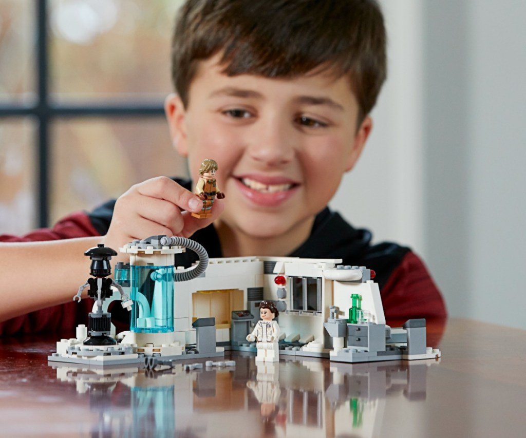 Kids playing with LEGO Start Wars Hoth set 